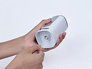 Insert the water suction hose